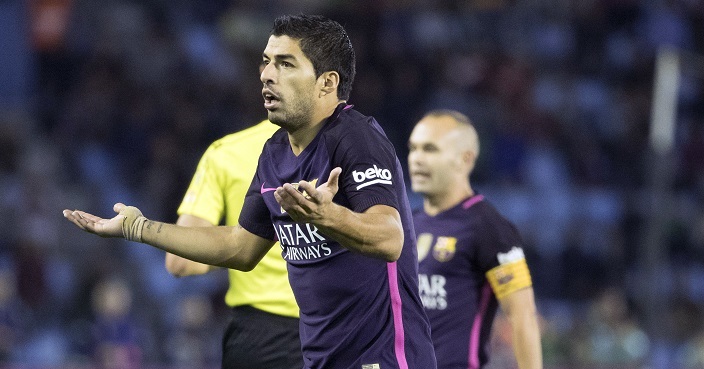 Barcelona's Luis Suarez gestures, during the Spanish La Liga soccer match between Celta Vigo and FC Barcelona at the Balaidos stadium in Vigo, Spain, Sunday, Oct. 2, 2016. (AP Photo/Lalo R. Villar)