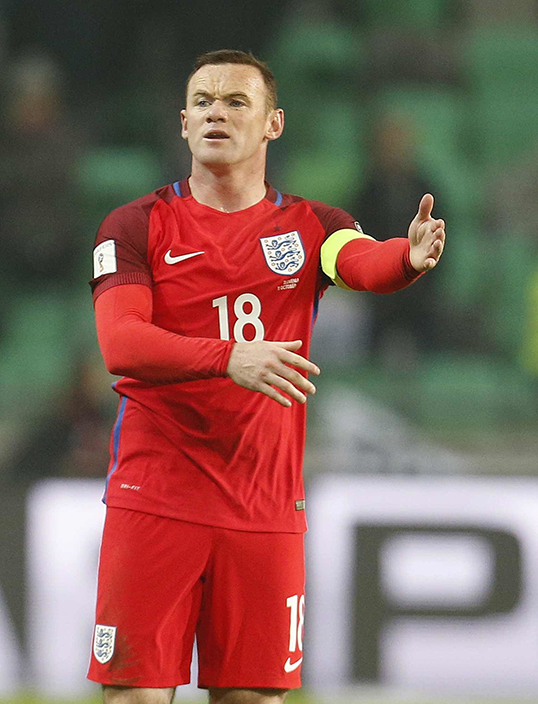 England's Wayne Rooney gestures during the World Cup Group F qualifying soccer match between Slovenia and England, at Stozice stadium in Ljubljana, Slovenia, Tuesday, Oct. 11, 2016. (AP Photo/Darko Bandic)