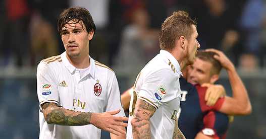 Milan's Juraj Kucka, right, is comforted by his teammate Alessio Romagnoli after his own goal during the Italian Serie A soccer match between Genoa and Milan at the Luigi Ferraris stadium in Genoa, Italy, Oct. 25, 2016. (Simone Arveda/ANSA via AP)