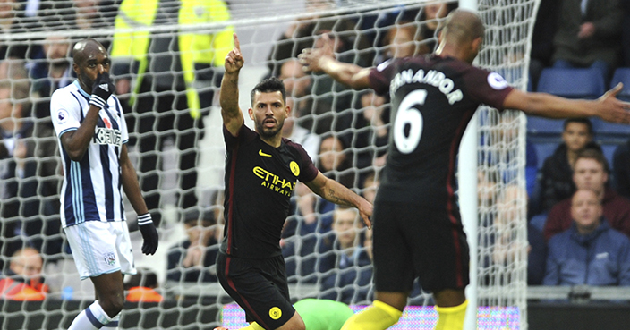 Manchester City's Sergio Aguero, centre, celebrates with teammates after scoring his second goal during the English Premier League soccer match between West Bromwich Albion and Manchester City, at the Hawthorns in West Bromwich, England, Saturday, Oct. 29, 2016. (AP Photo/Rui Vieira)