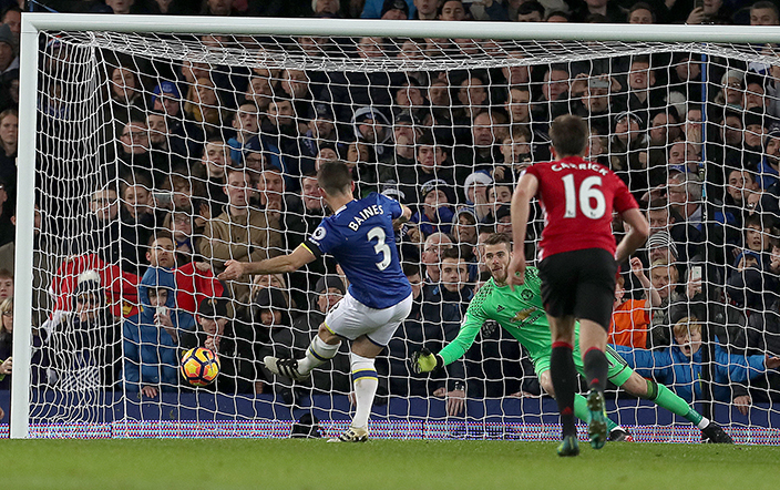 Everton's Leighton Baines,scores his side's first goal of the game from the penalty spot during the English Premier League soccer match between Everton and Manchester United,at Goodison Park, in Liverpool, England, Sunday Dec. 4, 2016. (Peter Byrne/PA via AP)