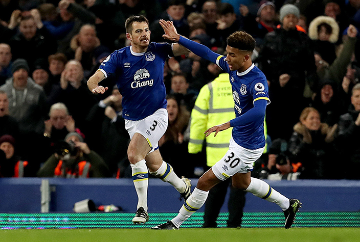 Everton's Leighton Baines, left, celebrates scoring against Manchester United during the English Premier League soccer match at Goodison Park, Liverpool, England, Sunday Dec. 4, 2016. (Peter Byrne/PA via AP)