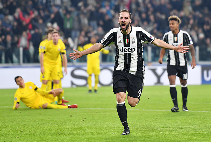 Juventus' Gonzalo Higuain celebrates after scoring a goal during the Uefa Champions League group H soccer match between Juventus and Dinamo Zagreb at the Juventus stadium in Turin, Italy, Wednesday, Dec. 7, 2016 (Alessandro Di Marco/ANSA via AP)