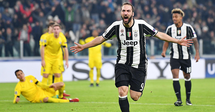 Juventus' Gonzalo Higuain celebrates after scoring a goal during the Uefa Champions League group H soccer match between Juventus and Dinamo Zagreb at the Juventus stadium in Turin, Italy, Wednesday, Dec. 7, 2016 (Alessandro Di Marco/ANSA via AP)