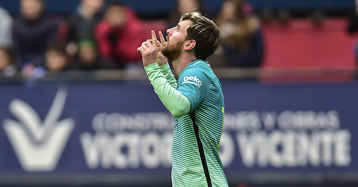 FC Barcelona's Lionel Messi, celebrates scoring a goal during the Spanish La Liga soccer match between FC Barcelona and Osasuna, at El Sadar stadium, in Pamplona, northern Spain, Saturday, Dec.10, 2016. (AP Photo/Alvaro Barrientos)