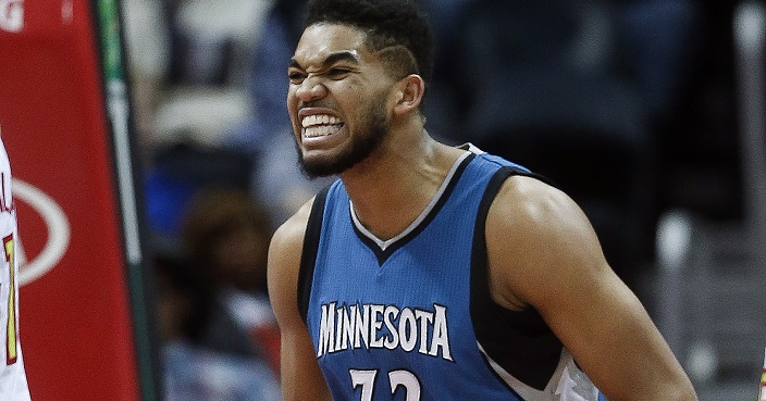 Minnesota Timberwolves center Karl-Anthony Towns (32) reacts after being fouled and scoring in the first half of an NBA basketball game against the Atlanta Hawks Wednesday, Dec. 21, 2016, in Atlanta. (AP Photo/John Bazemore)