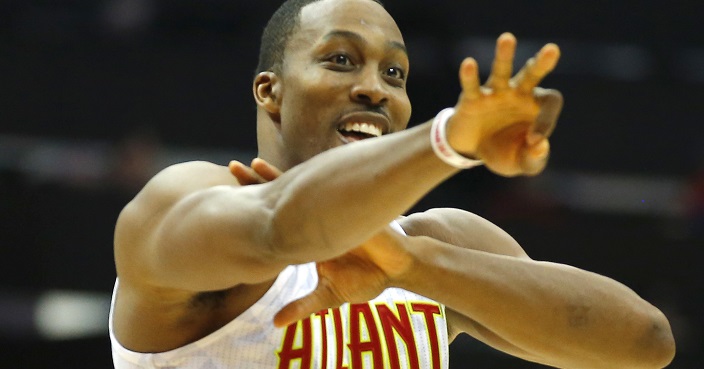 Atlanta Hawks center Dwight Howard (8) reacts in the second half of an NBA basketball game against the New York Knicks on Wednesday, Dec. 28, 2016, in Atlanta. Atlanta won the game 102-98 in overtime. (AP Photo/Todd Kirkland)