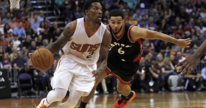 Phoenix Suns guard Eric Bledsoe (2) drives past Toronto Raptors guard Cory Joseph (6) during the second half of an NBA basketball game Thursday, Dec. 29, 2016, in Phoenix. The Suns won 99-91. (AP Photo/Ricardo Arduengo)