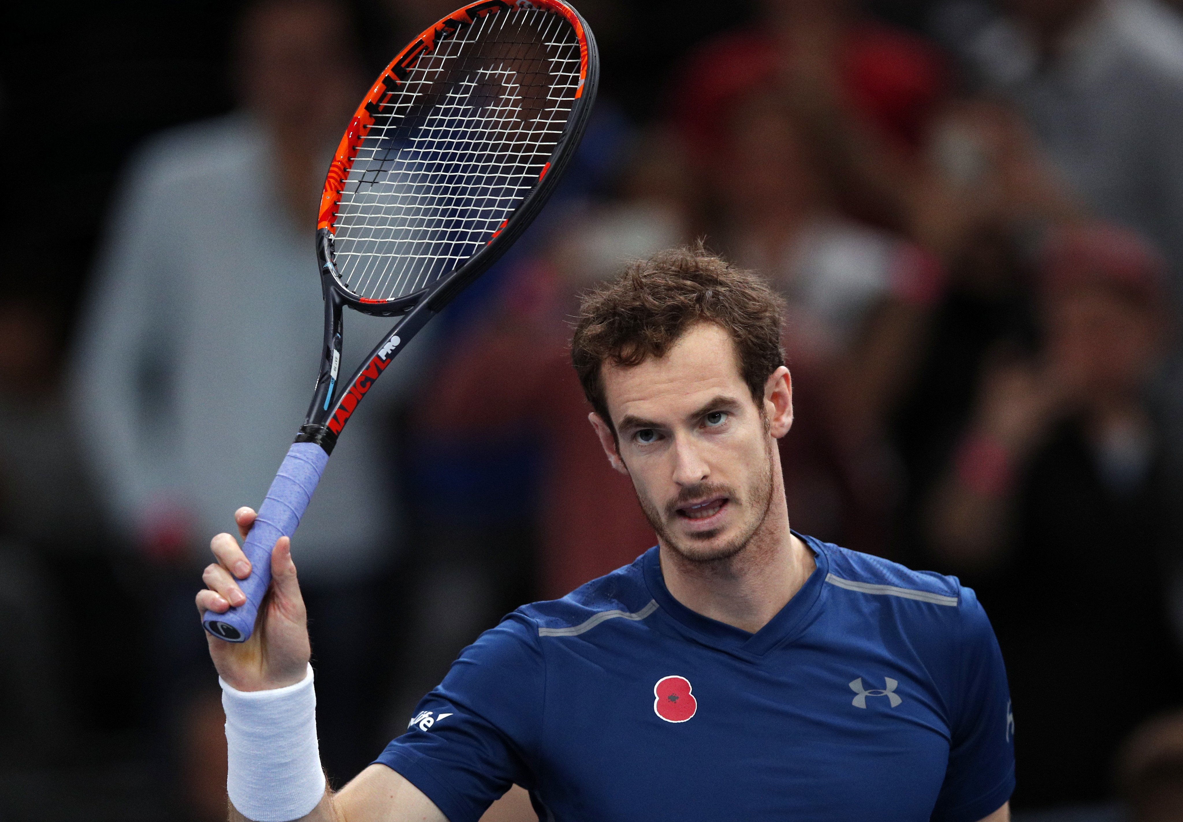 Britain's Andy Murray waves fans as he arrives for a training session during the Paris Masters tennis tournament at the Bercy Arena, in Paris, Saturday, Nov. 5, 2016. Andy Murray will hold the No. 1 spot for the first time after reaching the Paris Masters final following Milos Raonic's withdrawal from the tournament. (AP Photo/Christophe Ena)