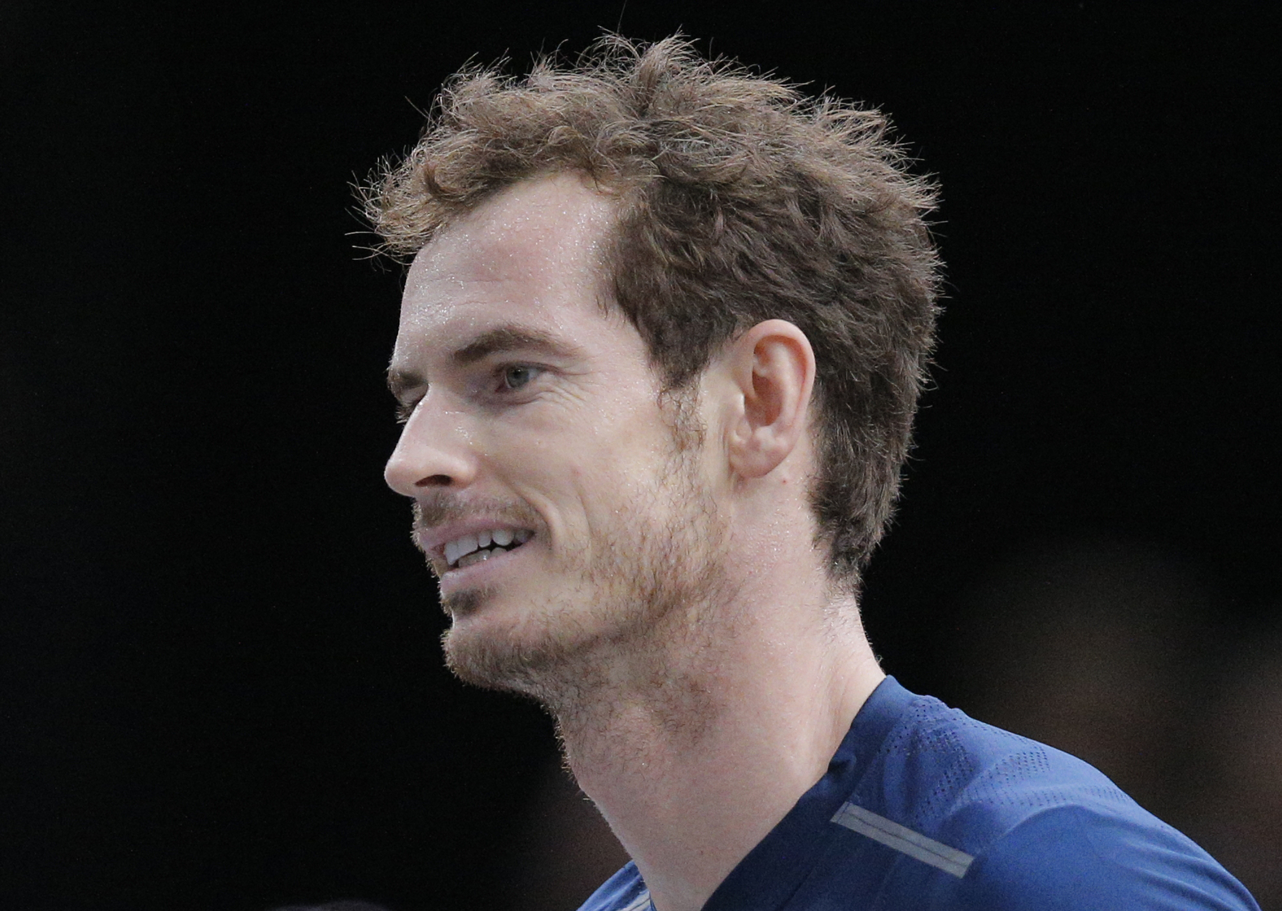 Britain's Any Murray smiles during a training session at the central court at the Paris Masters tennis tournament at the Bercy Arena in Paris, Saturday, Nov. 5, 2016. Andy Murray becomes world tennis No. 1 after Milos Raonic walkover in Paris. (AP Photo/Michel Euler)