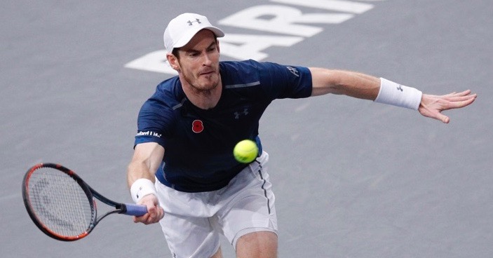 Britain's Andy Murray returns the ball to Tomas Berdych of Czech Republic during the quarterfinal match of the Paris Masters tennis tournament at the Bercy Arena, in Paris, Friday, Nov. 4, 2016. (AP Photo/Christophe Ena)