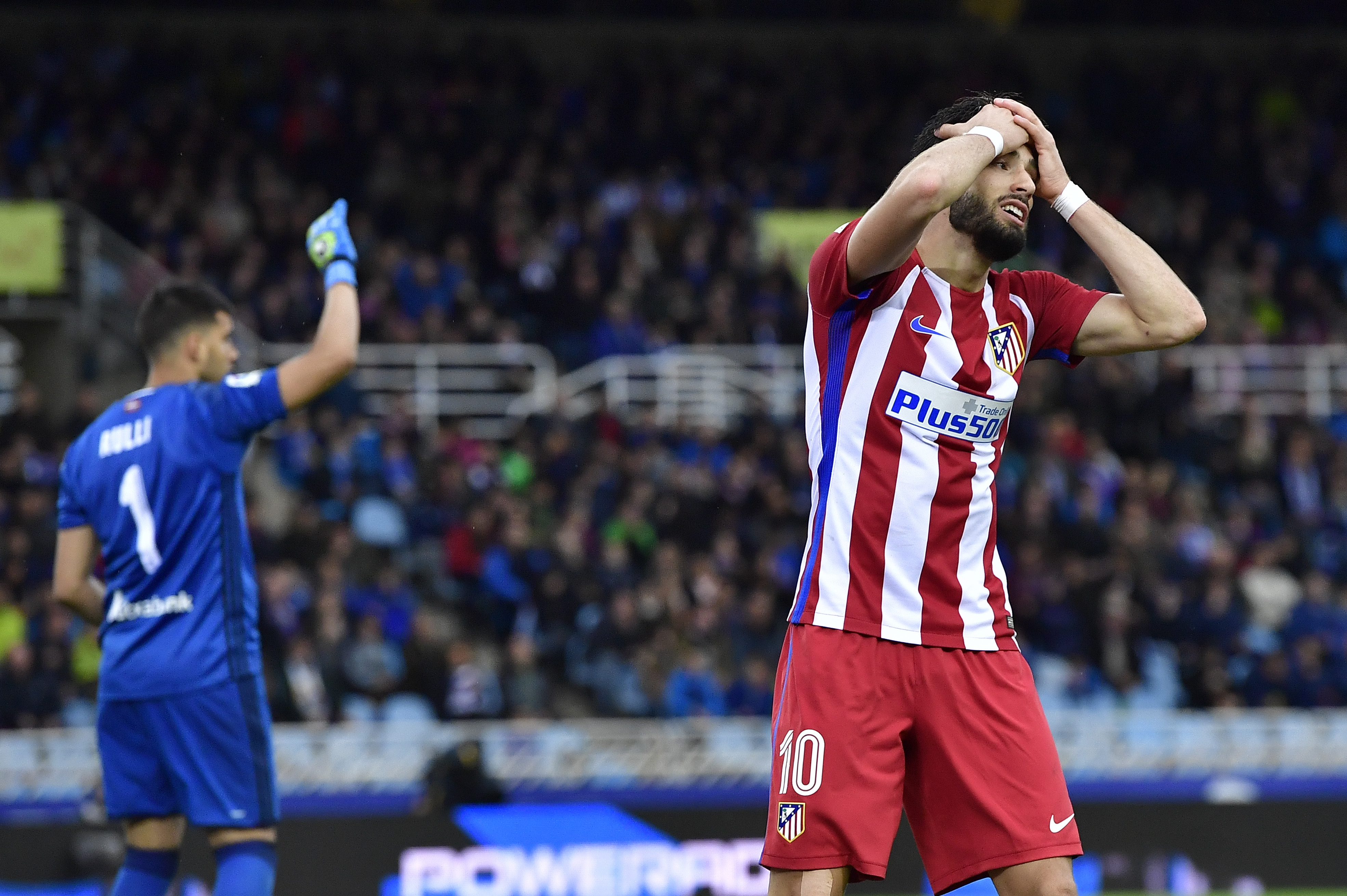 Atletico de Madrid's Yannick Carrasco misses an opportunity to score during the Spanish La Liga soccer match between Real Madrid and Real Sociedad, at Anoeta stadium, in San Sebastian, northern Spain, Saturday, Nov. 5, 2016. Atletico de Madrid lost the match 2-0. (AP Photo/Alvaro Barrientos)