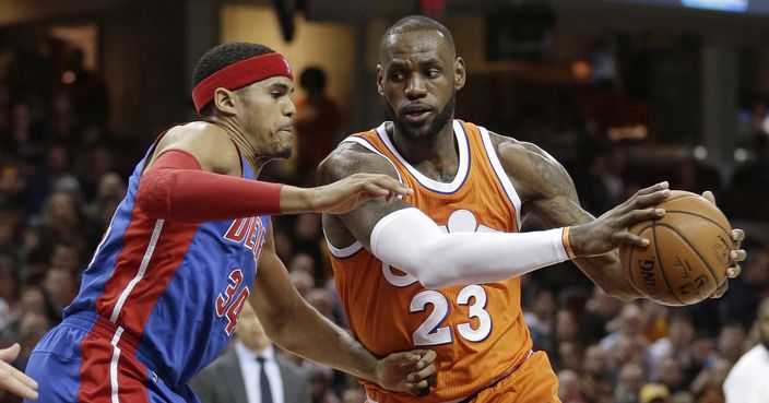 Cleveland Cavaliers' LeBron James (23) drives past Detroit Pistons' Tobias Harris (34) in the first half of an NBA basketball game, Tuesday, March 14, 2017, in Cleveland. (AP Photo/Tony Dejak)