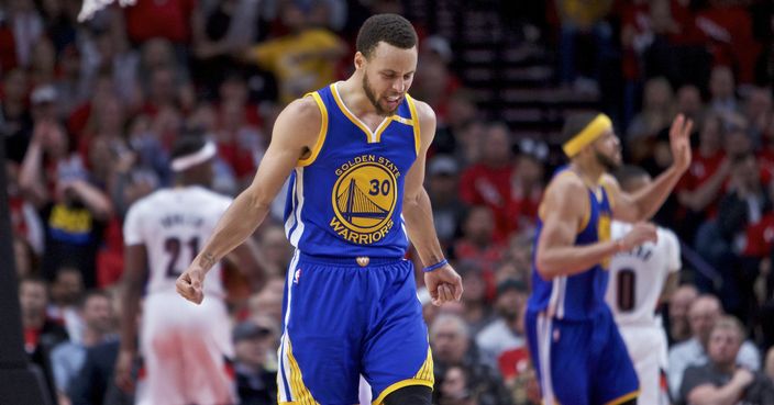 Golden State Warriors guard Stephen Curry reacts after making a basket against the Portland Trail Blazers during the second half of Game 3 of an NBA basketball first-round playoff series Saturday, April 22, 2017, in Portland, Ore. (AP Photo/Craig Mitchelldyer)