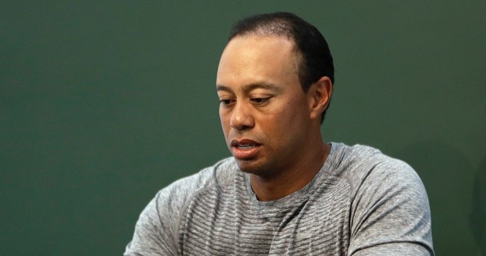 FILE - In this March 20, 2017, file photo, golfer Tiger Woods prepares to sign copies of his new book at a book signing in New York. Police say golf great Tiger Woods has been arrested on a DUI charge in Florida.
The Palm Beach County Sheriff's Office says on its website that Woods was booked into a county jail around 7 a.m. on Monday, May 29, 2017. (AP Photo/Seth Wenig, File)