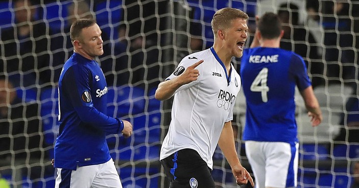 Atalanta's Andreas Cornelius celebrates scoring his side's fourth goal of the game against Everton, during the Europa League group E soccer match between Everton and Atalanta at the Goodison Park stadium in Liverpool, England, Thursday, Nov. 23, 2017. (Peter Byrne/PA via AP)