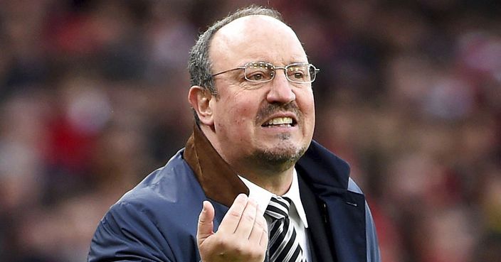 Newcastle United manager Rafael Benitez gestures on the touchline, during the English Premier League soccer match between Arsenal and Newcastle United, at the Emirates Stadium, in London, Saturday, Dec. 16, 2017. (Joe Giddens/PA via AP)