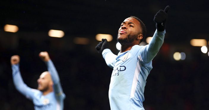 Manchester City's Raheem Sterling celebrates at the end of the English Premier League soccer match between Manchester United and Manchester City at Old Trafford Stadium in Manchester, England, Sunday, Dec. 10, 2017. City won 2-1. (AP Photo/Dave Thompson)