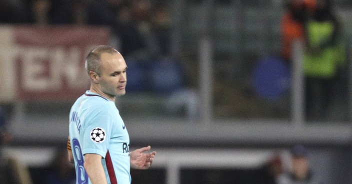 Roma's Patrik Schick, left, and Roma's Kevin Strootman, appeal for a foul during the Champions League quarterfinal second leg soccer match between between Roma and FC Barcelona, at Rome's Olympic Stadium, Tuesday, April 10, 2018. Second right is Barcelona's Andres Iniesta. (AP Photo/Gregorio Borgia)