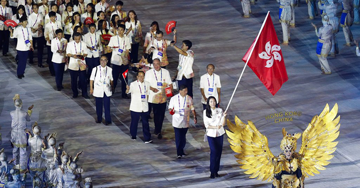 The Hong Kong team marches during the opening ceremony of the 18th Asian Games at Gelora Bung Karno Stadium in Jakarta, Indonesia on Saturday, Aug. 18, 2018. (AP Photo/Aaron Favila)